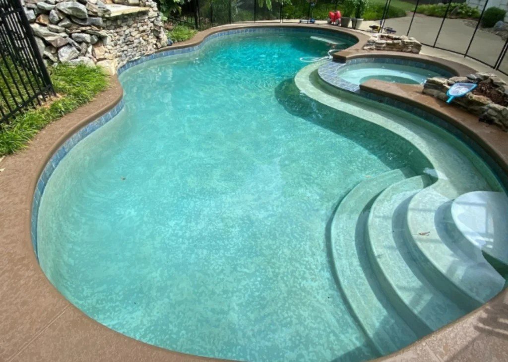 Swimming Pool with Circular Design and Stairs