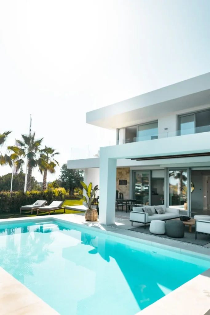 Modern House With A Pool And Outdoor Seating Area