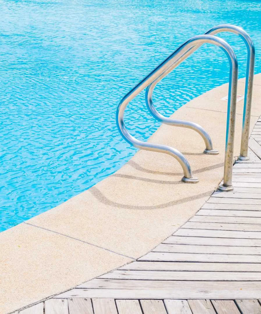 Pool Ladder And Blue Water